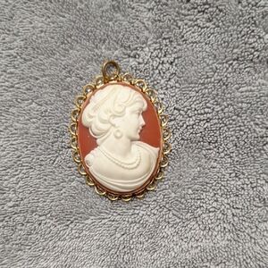 Elegant Gold and Cream Cameo Pendant